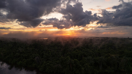 aerial images of sunrise in the Nanay River, within the Peruvian Amazon, Nanay River, water source for the city of Iquitos, black water rivers or Igapos in the interior of the Peruvian Amazon to visit