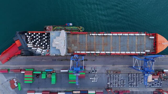 4K video shot with a drone while unloading the ship cargo to the customs section at the port istanbul