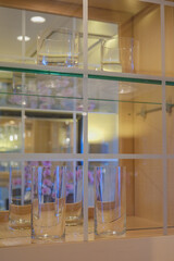 Luxurious ocean view or oceanview or outside balcony veranda cabin stateroom suite queen king double bed on luxury ocean liner cruiseship cruise ship in classic classy interior Art Deco style design