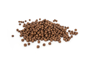 Fish Feed for animal (Catfish). Food for Catfish. Pellet feed pile isolated on white background.