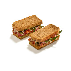 Sandwich isolated on dark background. Sandwich clipping path. Top view. Selective focus and copy space. 