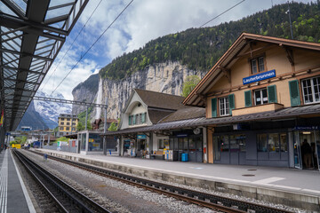 amazing beautiful place of village where we can see huge  mountain and many water fall  background village and yard   like heaven lauterbrunnen Switzerland