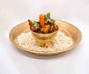 Delicious Flaky Rice and Fried Chicken Spicy Nepali masu chiura lunch on a plate chicken curry fried