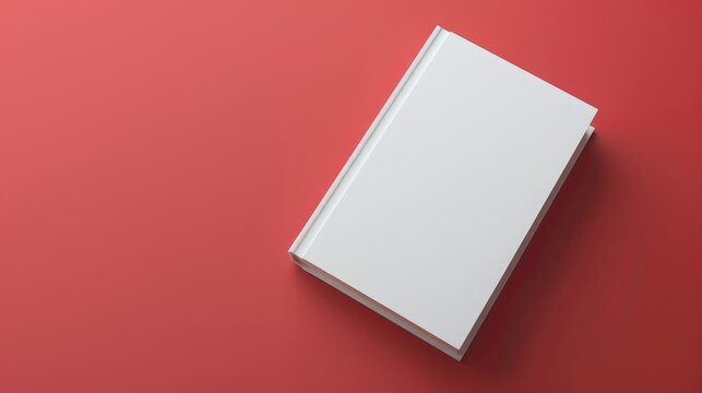 Minimalistic blank white book mockup on a plain red background, ready for personalized cover artwork