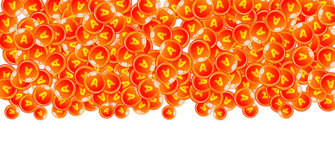 Vitamin A round capsules scattered randomly.