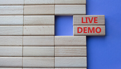 Live Demo symbol. Concept word Live Demo on wooden blocks. Beautiful purple background. Business...