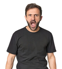 Studio portrait of young Hispanic male shouting very angry, rage concept, frustrated.