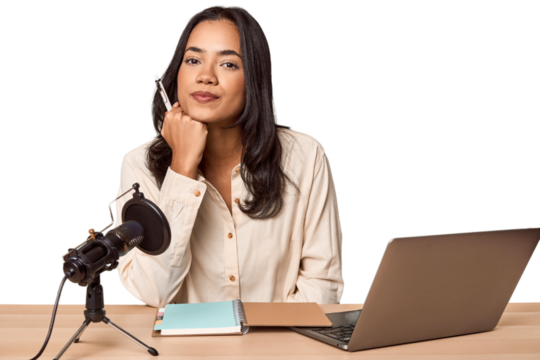 Filipino woman podcasting with mic and laptop