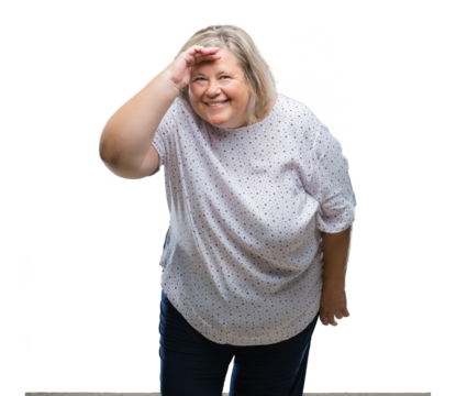 Senior plus size caucasian woman over isolated background very happy and smiling looking far away with hand over head. Searching concept.