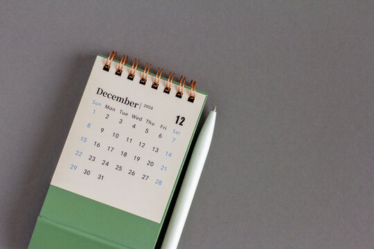 December calendar for 2024 on a gray background.