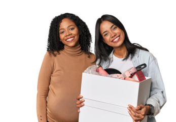 Latin women couple moving, one pregnant  happy, smiling and cheerful.