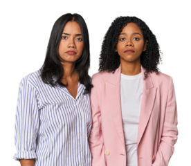 Young Latin businesswomen in studio sad, serious face, feeling miserable and displeased.