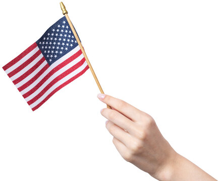 A beautiful female hand holds an American flag on a white background.