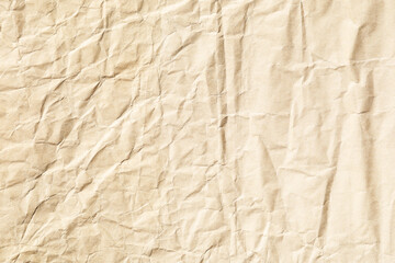 Crumpled and bumpy yellow background paper texture