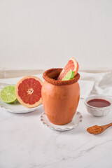 Refreshing Cantarito Drink in Authentic Clay Cup, from mexico