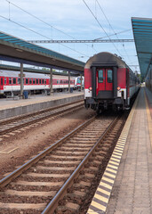 Fototapeta premium Railway tracks on the Slovak Railways and the Prešov railway station, which is the main railway station in the city of Prešov.
