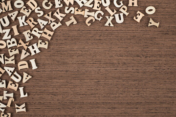 Vintage Wooden Letters on Brown Wooden Background Copy Space