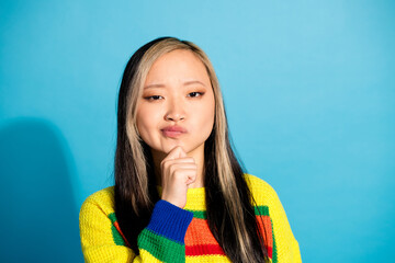 Photo portrait of pretty young girl look camera skeptical wear trendy striped outfit isolated on...