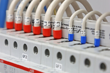 Connection of electrical modules using electrical insulated copper wires. Close-up. Soft focus.