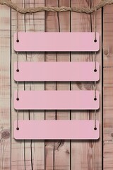 4 light pink wooden slats on the wall, 4 blank horizontal signs hanging side by side in the style of side. The background is a textured wood paneling surface.