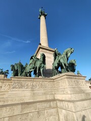 Obraz premium Details of Heroes' Square, (Budapest), one of the major squares in Budapest, Hungary, noted for its iconic Millennium Monument with statues featuring the Seven chieftains of the Magyars.