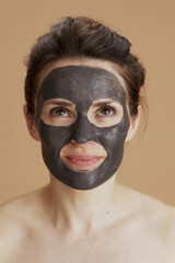 young 40 years old woman with facial mask