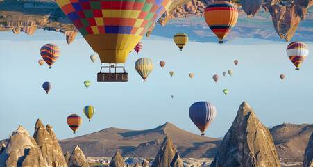 Welcome to amazing Cappadocia concept image. Fantastic unreal turned upside down landscape. Hot air...