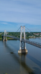 Vertical aerial photo of the Franklin Delano Roosevelt Mid-Hudson Bridge over the Hudson River, Poughkeepsie NY.  	