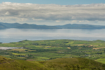 landscape with mountains water and clouds