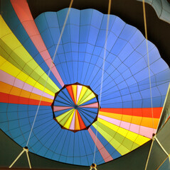 Fototapeta premium Closeup view inside of a multi colored hot air balloon