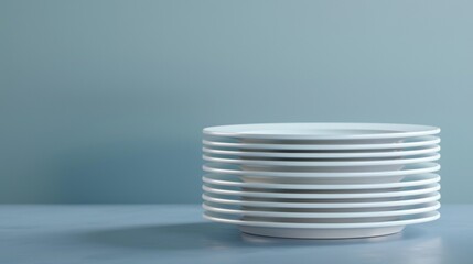 Obraz premium A pile of empty plates in a stack on a light background