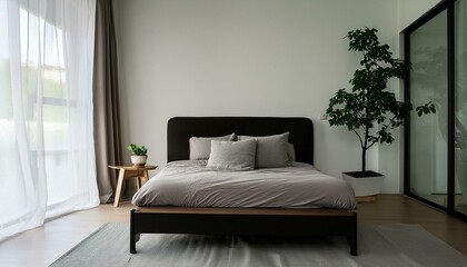 Fototapeta premium Minimalist bedroom with a platform bed, monochromatic color scheme, and uncluttered space