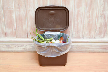 Food waste in a kitchen leftover vegetables can be composted and disposed of in an eco friendly way