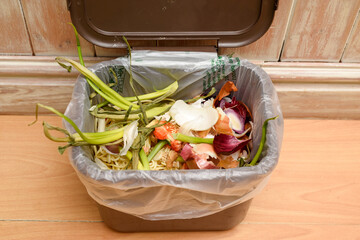 Food waste in a kitchen leftover vegetables can be composted and disposed of in an eco friendly way