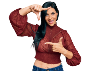 Young caucasian woman wearing casual clothes smiling making frame with hands and fingers with happy face. creativity and photography concept.