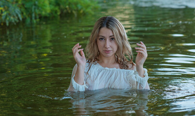 Fototapeta premium Natural appearance lady in the lake. Femininity concept, naturally skin