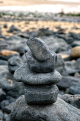 A stack of zen-like balancing stones on a beach in St Ives, Cornwall