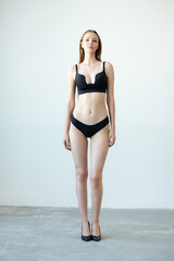 Fototapeta premium Perfect slim young model woman in lingerie studio snapshot