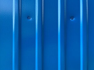Blue sheet metal pattern with stripes