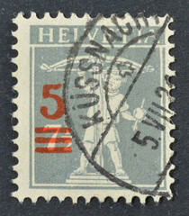  Cancelled postage stamp printed by Switzerland, that shows William Tell`s Son, overprinted, circa...