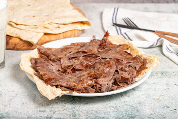 Meat Doner. Traditional Turkish cuisine taste. Cooked meat doner kebab on gray background. local...