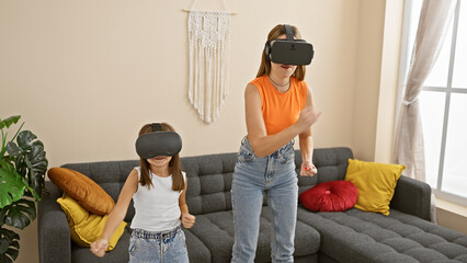 Mother and daughter play with virtual reality headsets in a cozy living room, enjoying modern family entertainment.