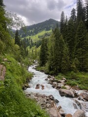 Obraz premium Stream in the mountains