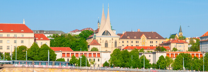 The Emmaus Monastery, Czech: Emauzy, in Prague, Czechia, is known for its twin towers and beautiful surroundings, making it a picturesque landmark in the city.