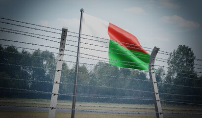 Barbed wire fence and flag of Madagascar - border concept - 3d illustration