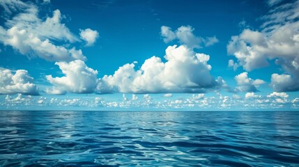 Tranquil sea or ocean scene with calm weather and clouds.

