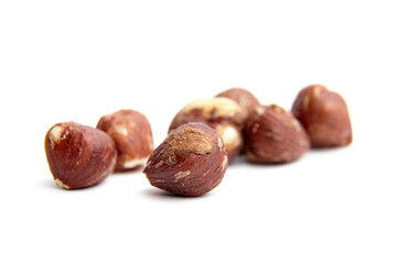 Close-up of multiple hazelnuts isolated on a white background. Perfect for food, health, and nutrition visuals