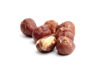 Close-up of multiple hazelnuts isolated on a white background. Perfect for food, health, and nutrition visuals