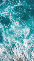 Fototapeta premium Beach and waves from top view. Turquoise water background from top view