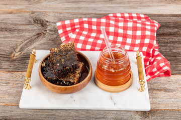 Magical honeycomb close up, Honey harvesting, honey picking. Organic honeycomb (Turkish Karakovan...